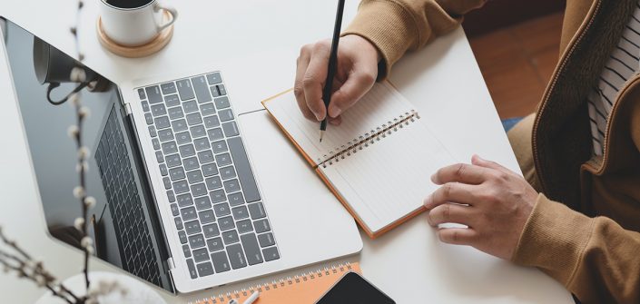 person-writing-on-notebook1